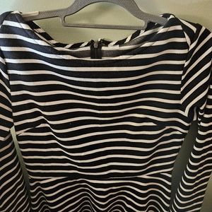 Size M brand Old Navy black and white horizontal zipup dress. Gently used.